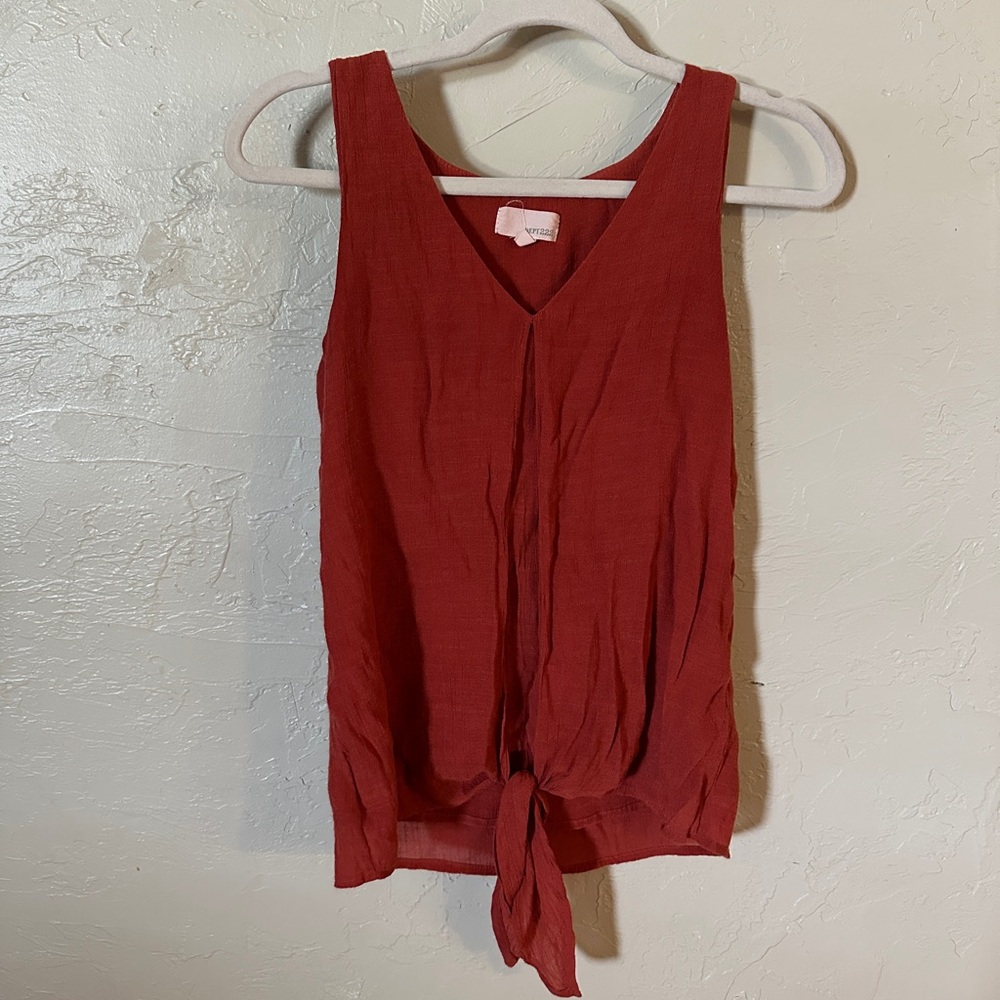 Orange sleeveless top